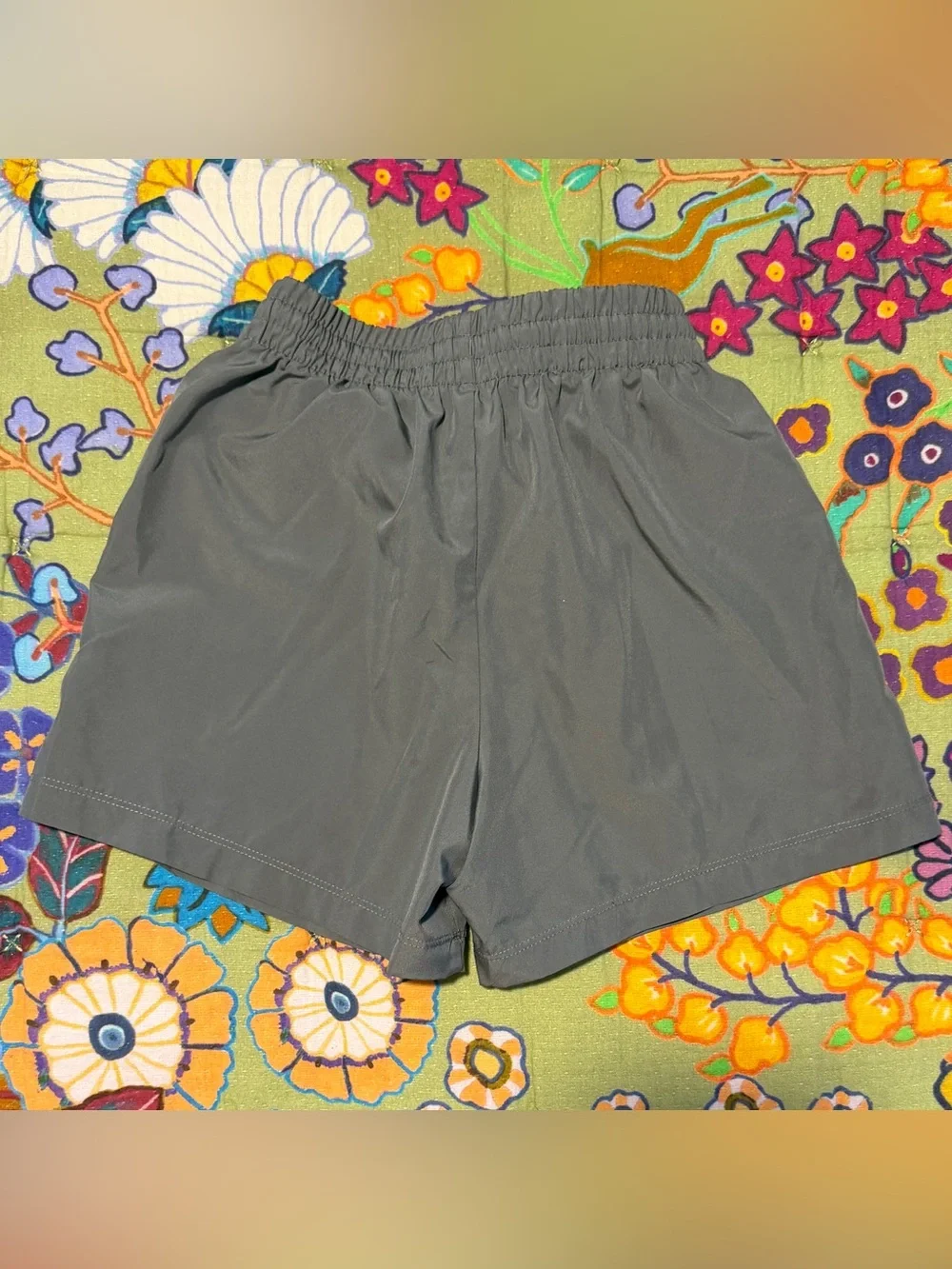 Nike Charcoal Gray Running Shorts with White Swoosh
